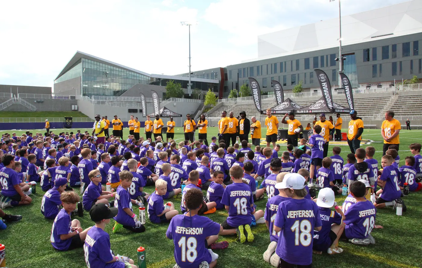 Justin celebrating with campers at the JJets Football Camp